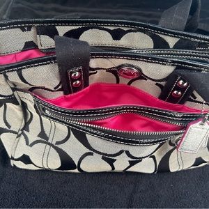 Vintage Coach bag, hot pink lining, multi zippers and pockets show high quality